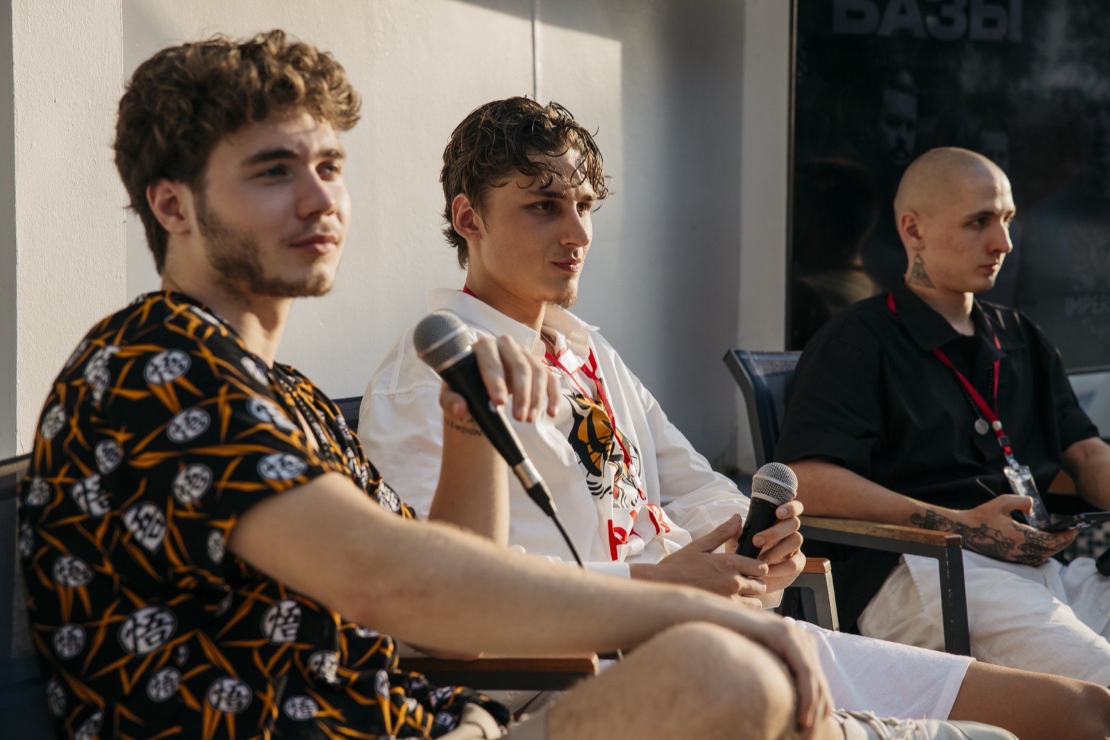 Vsevolod Gurkov and a speaker in conversation on stage